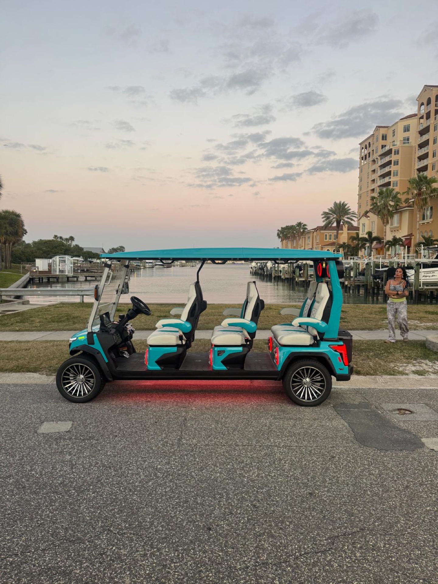 Sandy cart at the Clearwater waterfront with condos in the background